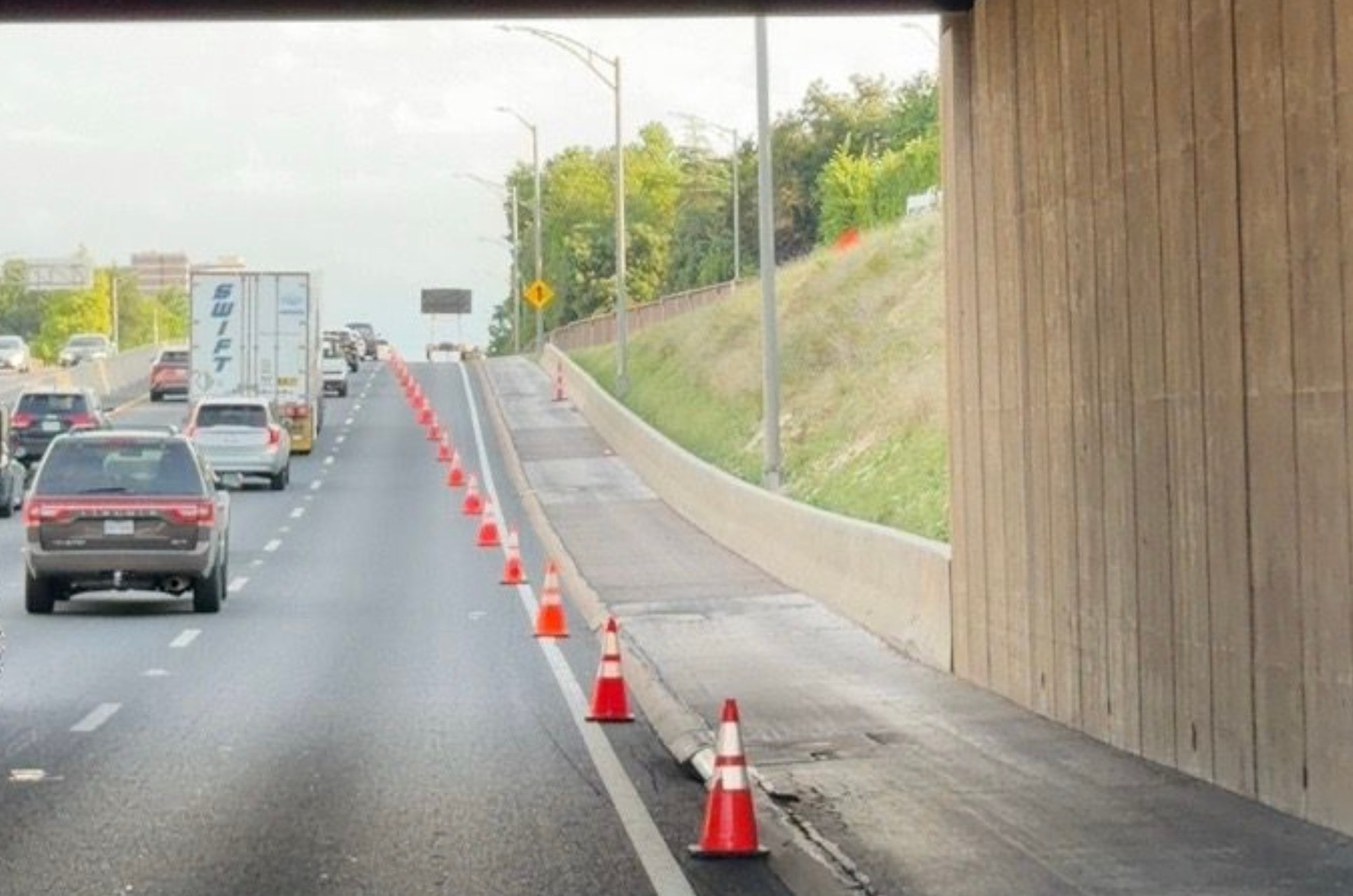 Lane closure with traffic cones and barricades
